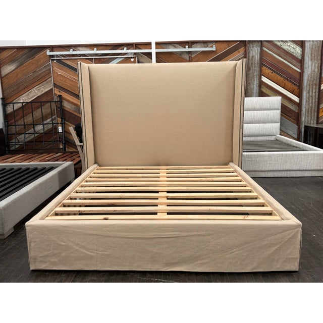 Design Plus Gallery presents the California King Size Wingback Bed from Restoration Hardware. This stately bed is...