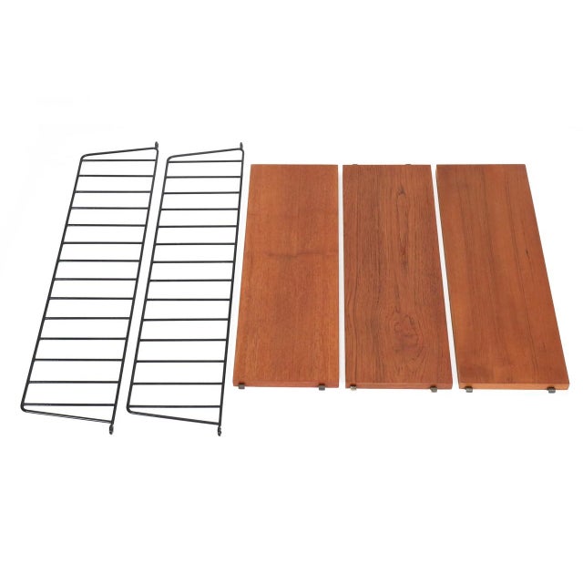 Original “String” wall shelf/shelving system, design: Kajsa & Nisse Strinning, 1949, Sweden. Not a reissue! Teak veneer....