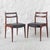 Solid teak frame, black faux leather upholstered seat One chair retains the NF (Furniture, Seat 16) quality label France...