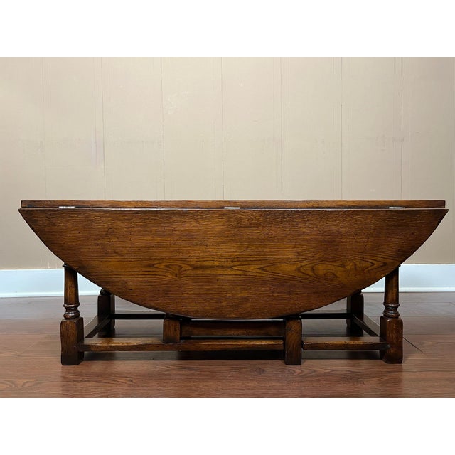 Antique English Oak Coffee Table Drop Leaf Jacobean Wake Table Gateleg c1930. Direct from England, a distinctive antique...