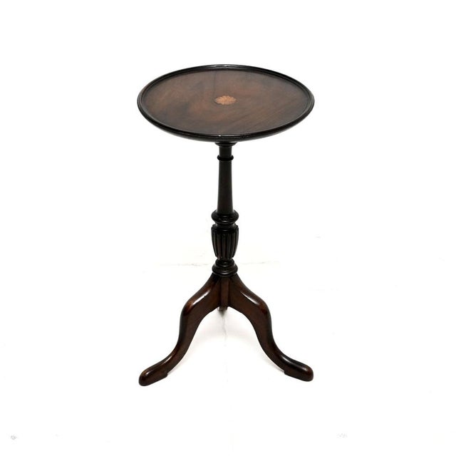 A lovely antique inlaid wine table, made in England and dating from around the 1930-50’s period. It is of very good...