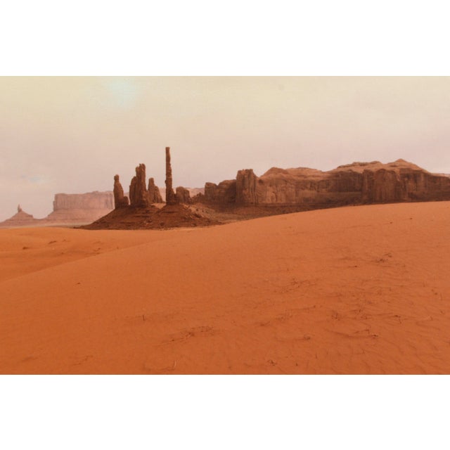 Photograph of Monument Valley by an unknown artist. Signed "CJB" in the lower right corner. Dated "April '84" in the lower...