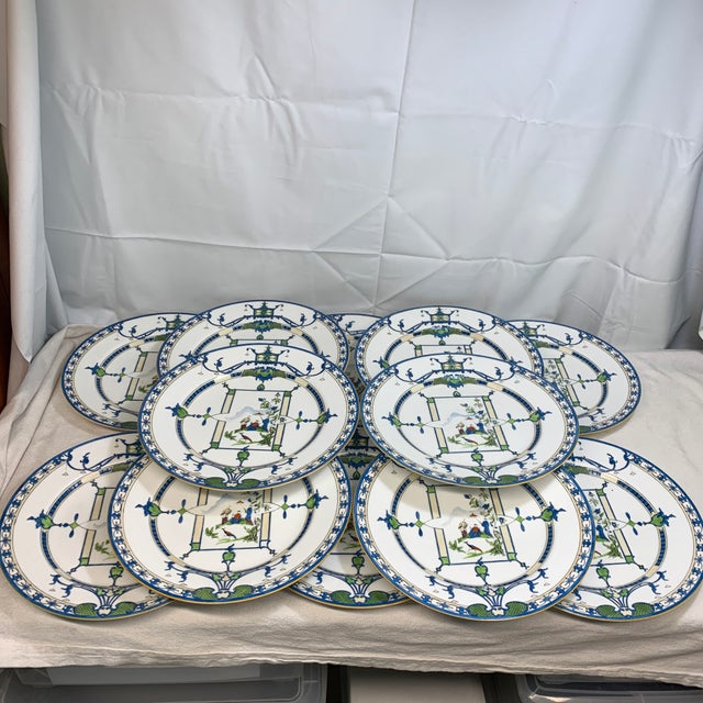 Elevate your next dinner party with a true conversation starter. This stunning set of antique Royal Worcester Chinoiserie...