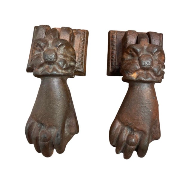 Add classic architectural character to your entryways with this matching pair of vintage cast iron door knockers. Crafted...
