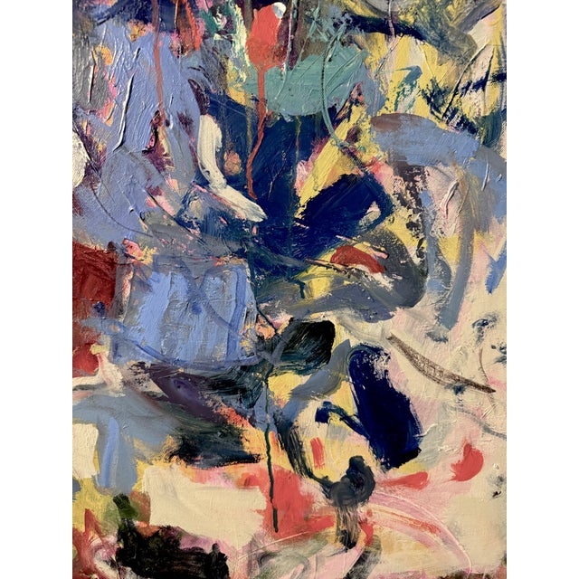 An energetic abstract filled with layered blues, sweeping gestures, and bursts of vivid color. Expressive marks and...