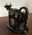 Antique 19th c. English pearlware Jackfield cow form cream jug decorated with black glaze enhanced by gilding. A small...