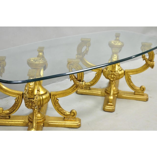 Vintage Italian Hollywood Regency Gold Gilt Metal Double Pedestal Base Coffee Table with Oval Beveled Glass Top. Circa Mid...