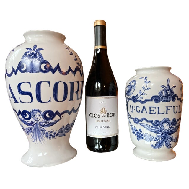 Pair of hand painted blue and white antique apothecary style jar vases by Lilly. Made in 1989, Portugal, these are...