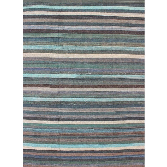 Versatile and unique color-tone flat-weave Kilim for a Modern or Classic design Flat-weave Kilim rug with vivid tones,...