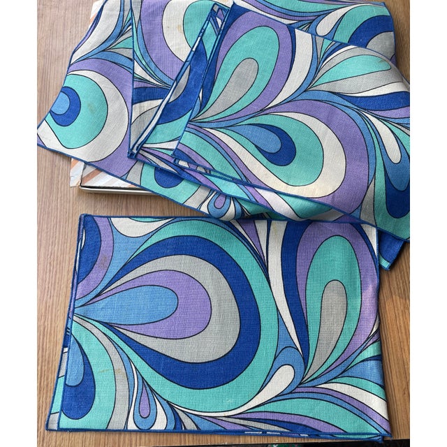 Set of 12 vintage 70s linen placemats in the very Pucci like print that was so popular at the time, finished edges, in the...