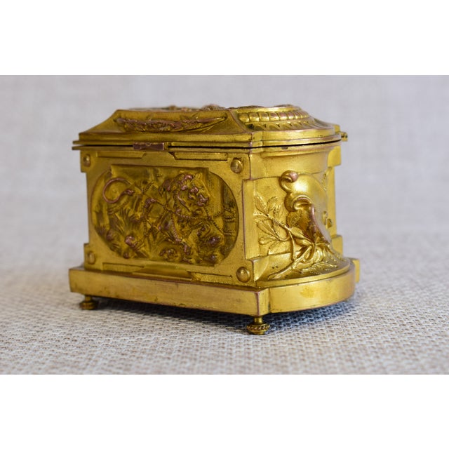 Refined and unique, this antique gilt copper box dating from the 19th century embodies all the charm of French decorative...