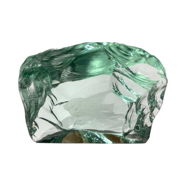 A beautiful glass sculpture by VIcke Lindstrand for Kosta Boda with an etched image of a fish embedded within the glass....