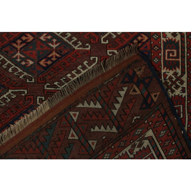 Textile Hand-Knotted Antique Russian Yamut Rug in Red, White Tribal Dyrnak Pattern For Sale - Image 7 of 7