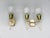 A few elegant wall lights - stylized torches - from the 1950s in the color combination brass with beige. One of the lights...