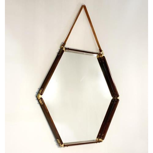 An exceptional Italian hexagonal mirror dating from the 1960s, distinguished by its refined craftsmanship and...
