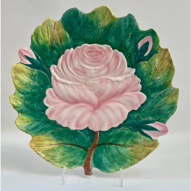 Large Italian platter featuring a raised pink rose design in the center, surrounded by green leaves by Zaccagnini, an...