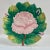 Large Italian platter featuring a raised pink rose design in the center, surrounded by green leaves by Zaccagnini, an...