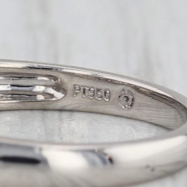 Gemstone Information: - Natural Diamonds - Total Carats - 0.27ctw Cut - Round Brilliant 0.02ctw, Baguette 0.25ctw Color -...