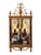 A striking pair of giltwood mirrors with elaborate carved and gilt cresting. Each mirror is topped with a central flaming...