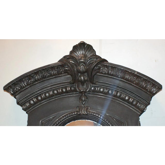 Vintage fiberglass window frame mirror in mid 19th century French style. Oval glass reserve and arched top frame.