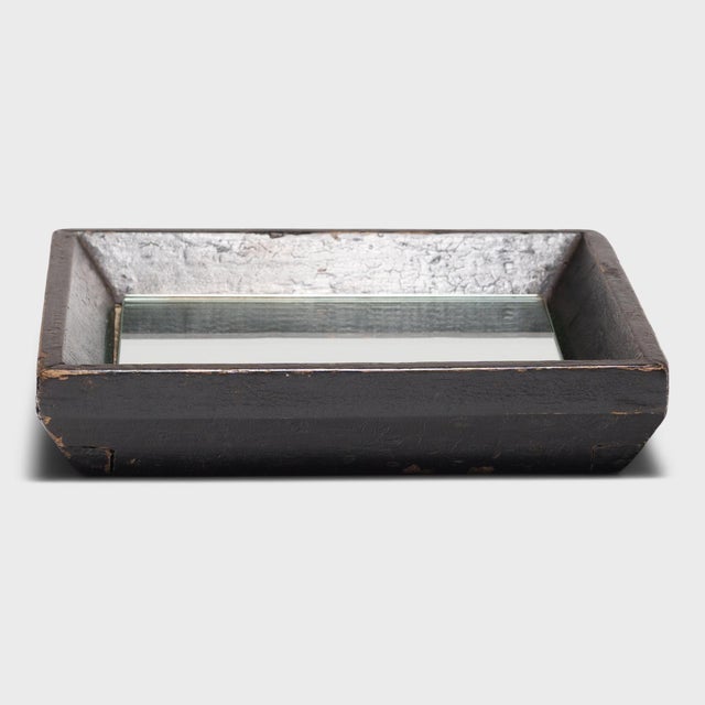 Simple lines, a modest form, and a layer of hand-brushed lacquer give this petite wooden tray a provincial charm that...