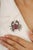 This whimsical ruby and diamond crab brooch is crafted in 925 sterling silver and showcases a vibrant 6.4 carat ruby...