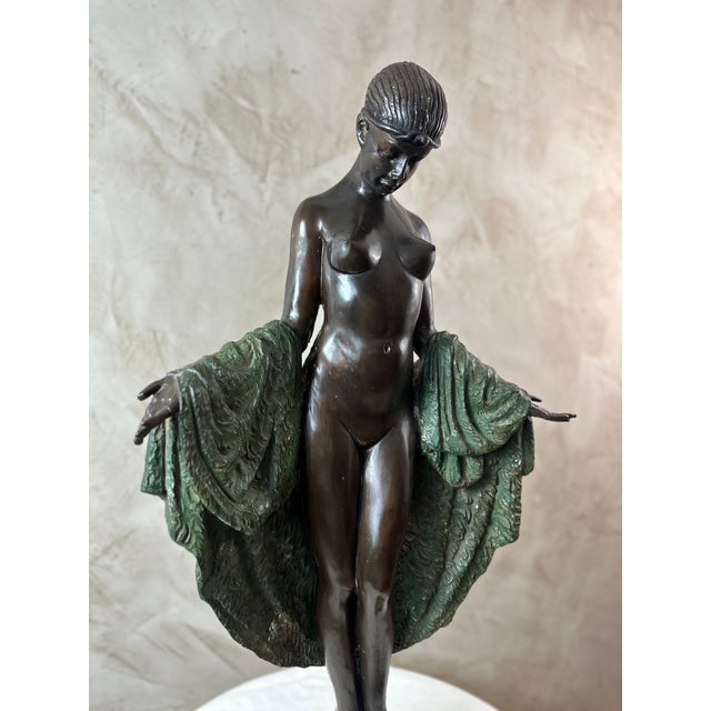 Beautiful French Art Deco bronze figure of a Dancer, by Joseph Emmanuel Descomps Cormier in a standing pose, with arms...