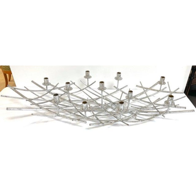 12 Light French Modern Kinetic Silvered Metal Candelabra Centerpiece France, Circa 1980s A unique 12-Light French Modern...