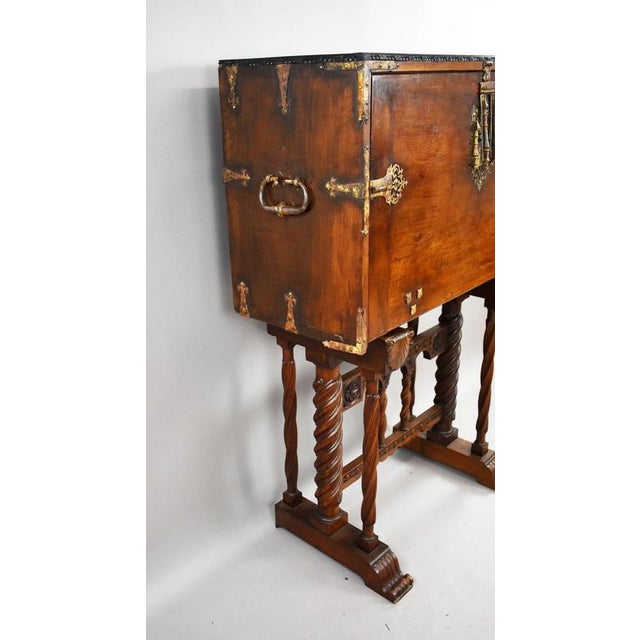 17th Century Spanish Walnut Bargueño Cabinet on Later Stand A striking 17th century Spanish walnut bargueño cabinet,...