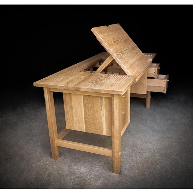 The Easel Art Desk is crafted entirely out of reclaimed solid white oak and walnut hardwoods with a mix of brass and...