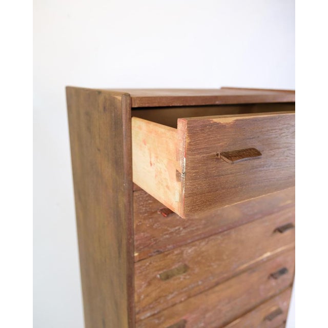 This chest of drawers is a beautiful example of danish design from the 1960s, created by the talented designer poul m....