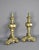 Sourced in Southwest France, this splendid pair of fire dogs / andirons feature decorative embellished flowers to the tops...