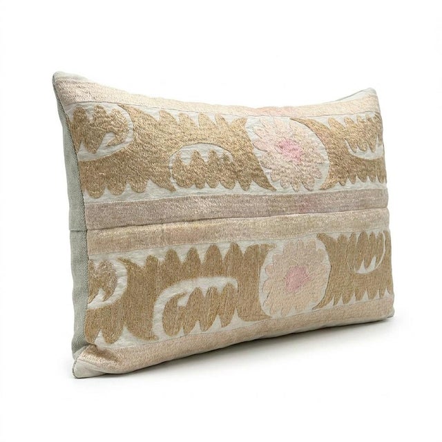 This beautiful 15'' x 24'' hand-embroidered Suzani pillow cover was made from authentic Uzbek cotton fabric. The intricate...