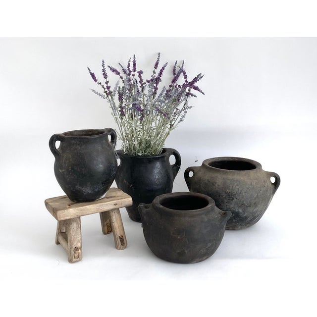 Over 100 years old and used for making and storing yoghurt, these handmade vessels are irregular in shape and made from a...