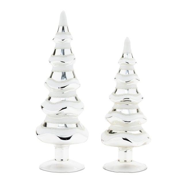 Embrace the magic of winter with this Snowy Glass Pine Tree set. Featuring wintry white and silver tones, these trees...