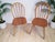 Introducing our exquisite vintage pair of Ercol Windsor dining chairs. Designed by the renowned Luciano Ercolani for Ercol...