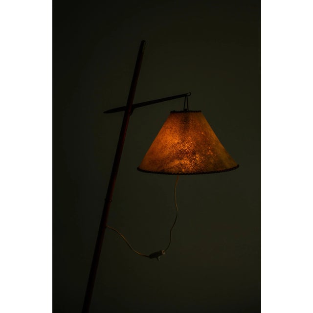 - Very rare height adjustable floor lamp - Brass, leather, teak - Mid-century piece from the 1950s European Plug (up to...