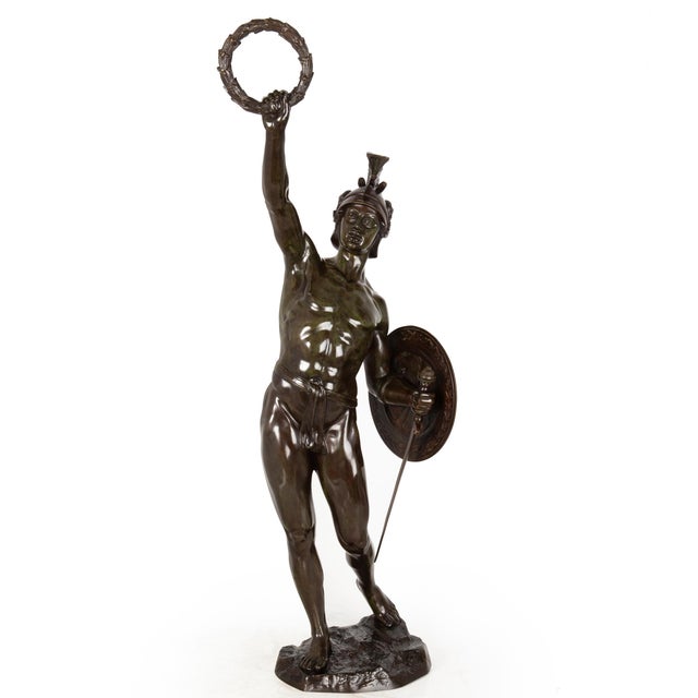 VICTORIOUS ACHILLES Probably German, circa 1900 28 1/4" H x 7" D x 7 1/2" W Patinated sand-cast bronze Unsigned A powerful...