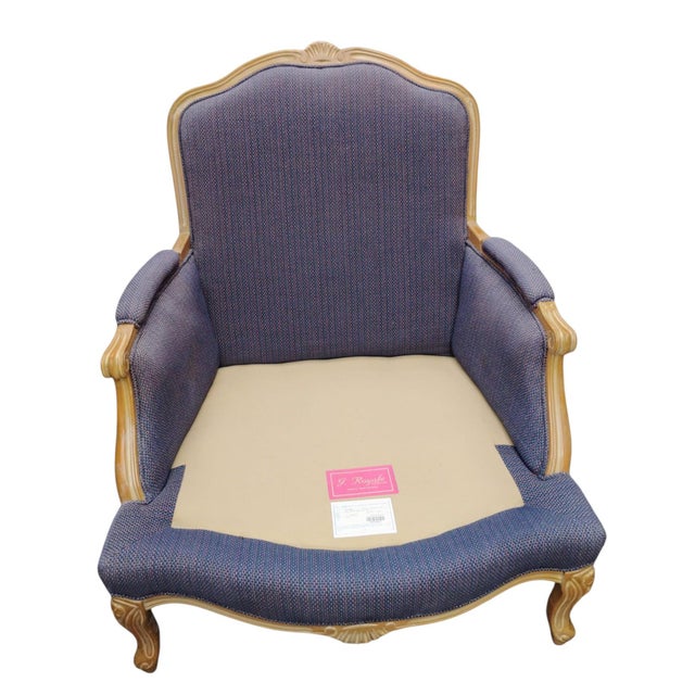 Vintage J. Royale French bergère chair & ottoman with a gilded wood frame Indulge in the ultimate blend of historical...