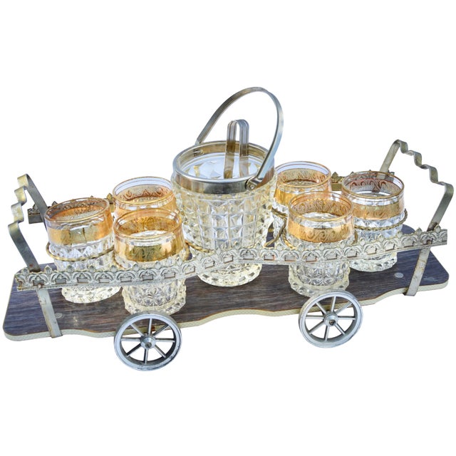 Stunning and festive midcentury cocktail set of six heavy hand-cut 24% lead crystal rocks glasses with ornate 22-karat...