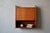 This wall-mounted secretary desk, or suspended desk, dates from the 1960s. with its deep teak finish and clean lines, it's...