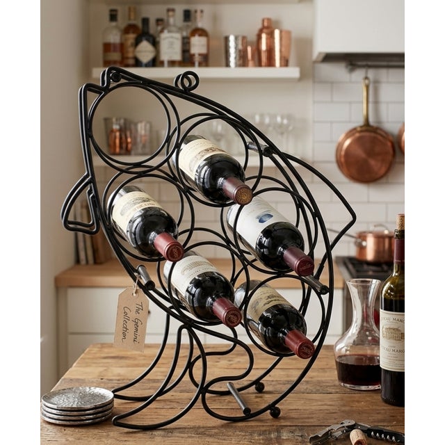 ​Maximize your countertop style with this striking vintage vertical fish wine rack. Constructed from heavy-gauge bent wire...