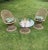 This lovely vintage bistro set, by Russell Woodward, is made from woven, spun fiberglass. There are two “starburst”...