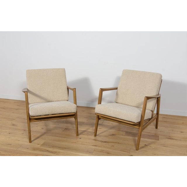 This pair of armchairs was produced by the Polish company Swarzędzka Furniture Factory in 60s. Comfortable armchairs with...