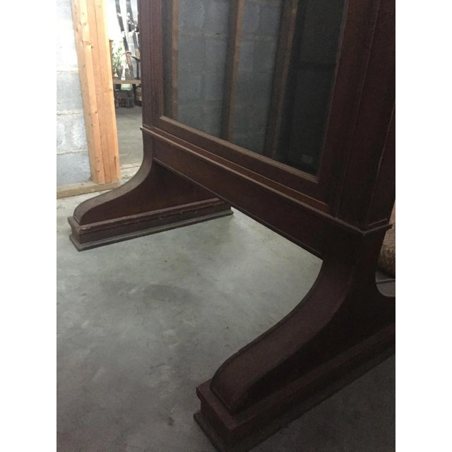 Antique display case used in Alabama Post Office. Double sided with glass doors. Locks that work with two keys. This was...