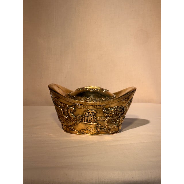 Decorative item Chinese brass fend shui lucky dragon and phoenix ingot. Designed to attract wealth, luck, and good energy...