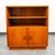 Danish teak bookshelf cabinet with 2 doors below and single shelf in the center. Unsigned example. Great for use as a...