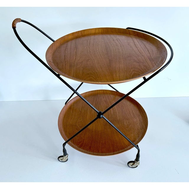 Vintage swedish scandinavian serving cart by jie gantofta featuring a double leveled foldable black steel structure with 2...