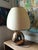 A master piece that has no equivalent. U unique amorfe formed lampfoot with gold- and silver plating. The lampshade is an...