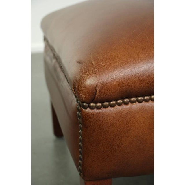 Cognac Cowhide Leather Ottoman with Decorative Nails For Sale - Image 9 of 10